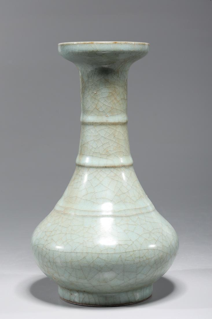 Chinese Celadon Glazed Porcelain Vase: Chinese celadon glazed porcelain vase; overall good condition; H 8" x D 4 1/2" (approx.)Provenance: Private Florida, USA Collection
