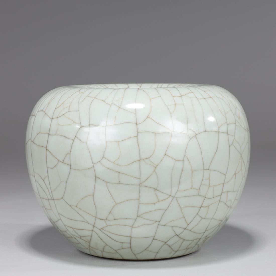 Chinese Crackle Glazed Porcelain Vase: Chinese celadon crackle glazed porcelain vase with six character mark to base; H 5 1/4" x W 6 1/4"