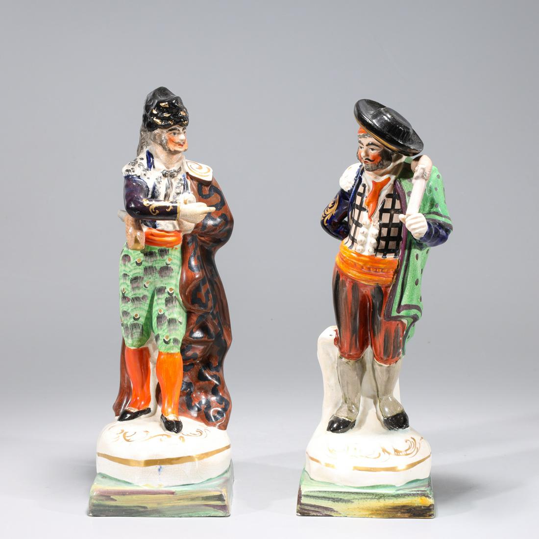 Pair of Antique Gilt Porcelain Staffordshire Figures: Pair of antique gilt porcelain Staffordshire figures of two theatrical Spaniards, early 20th century, unsigned; overall good condition, one statue with finger broken and repaired; H 12 1/2" x W 4" x D