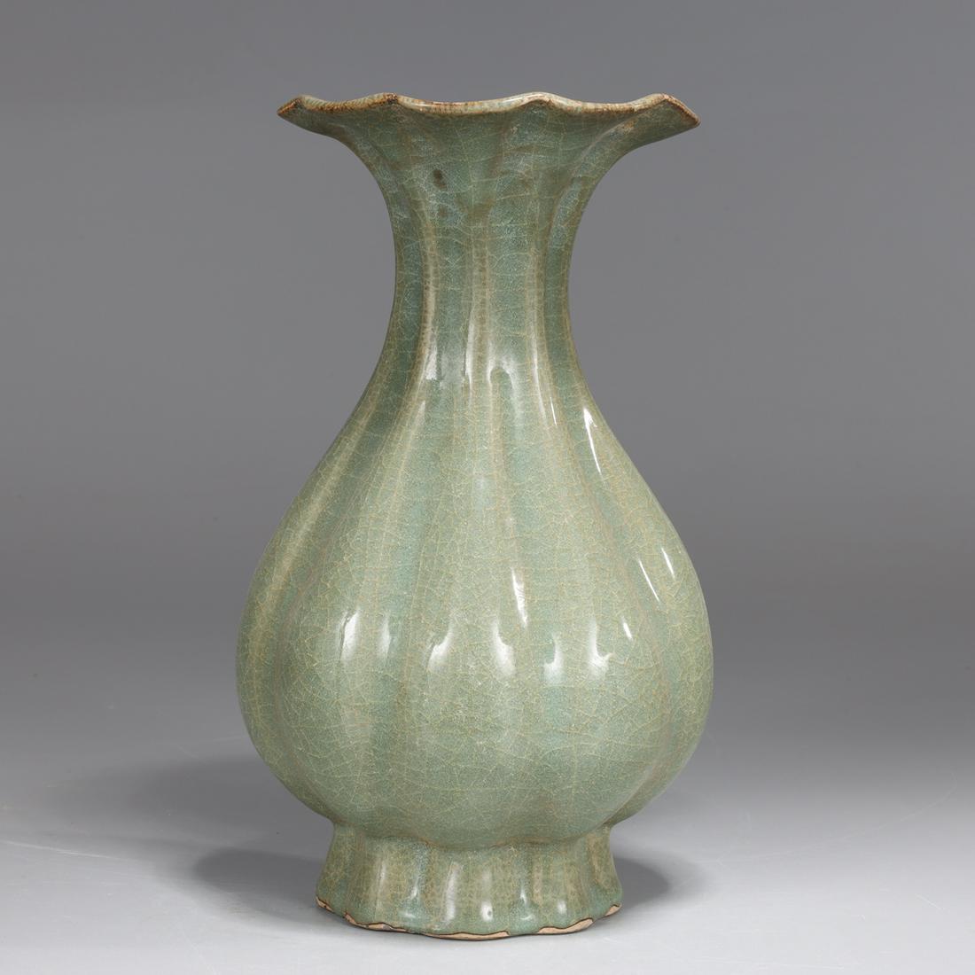 Chinese Celadon Glazed Vase: Chinese celadon glazed vase with fluted mouth; as-is condition with minor wear and flaws; H 9 1/2"Provenance: Private Florida, USA Collection
