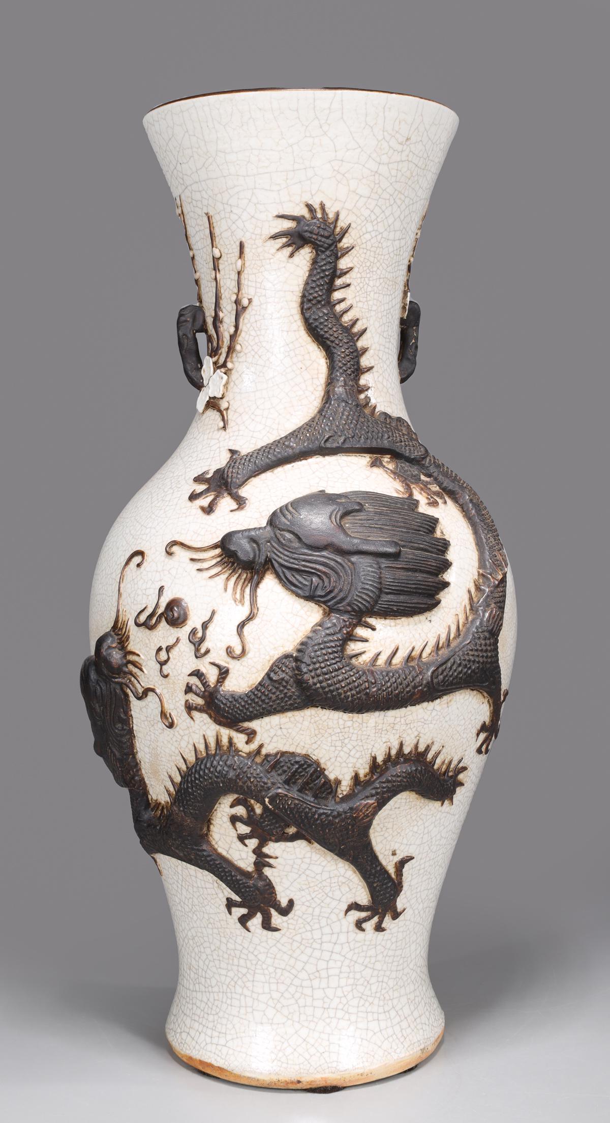 Chinese Crackle Glazed Porcelain Vase: Chinese crackle glazed porcelain vase of baluster form with well molded and slip-glazed dragon in relief, seal mark to base; minor chips, flaws and paint loss; H 20"