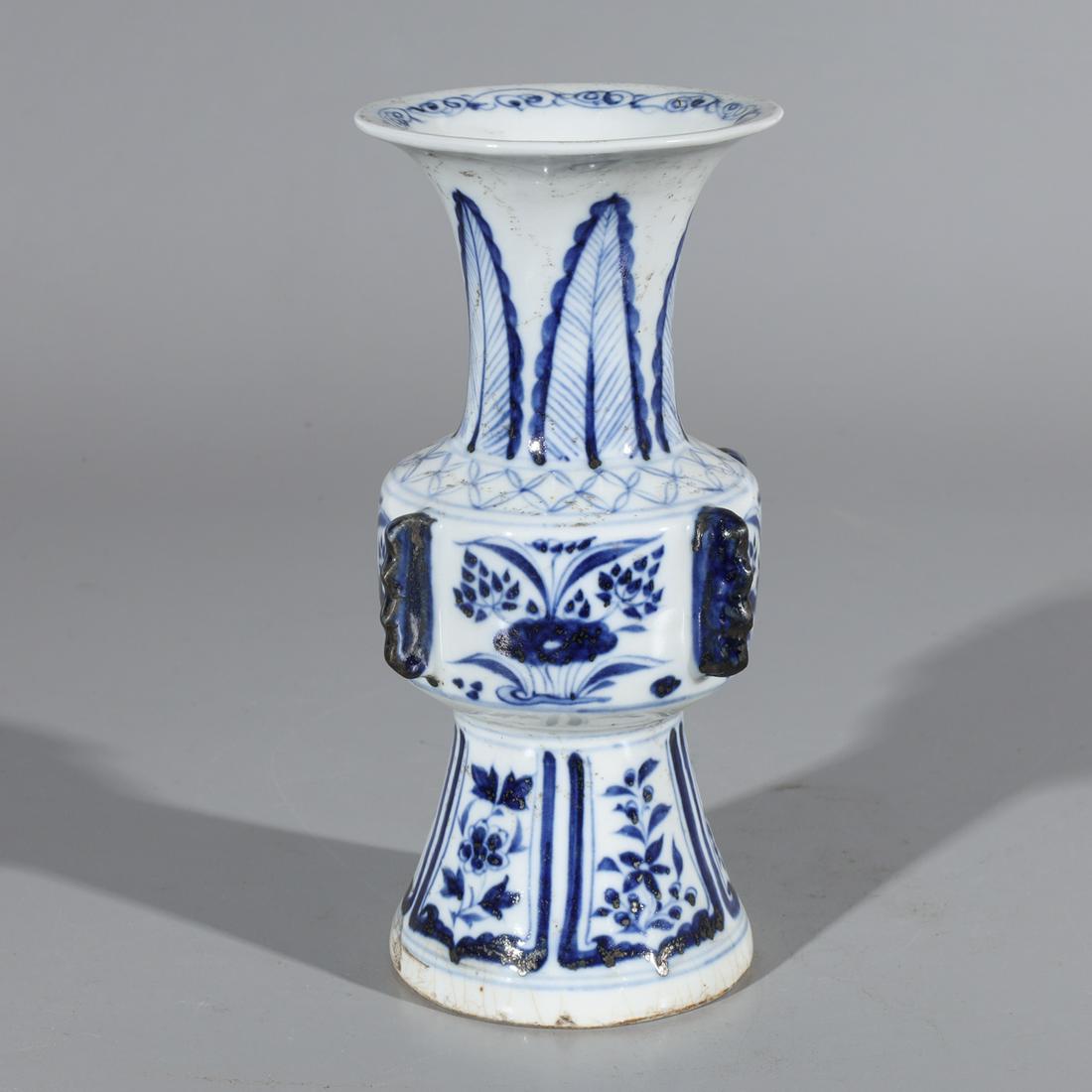 Chinese Blue & White Porcelain Beaker Vase: Chinese blue and white porcelain beaker vase with molded handles; some wear and soiling to body; H 9 3/4" x D 4 1/2" (approx.)