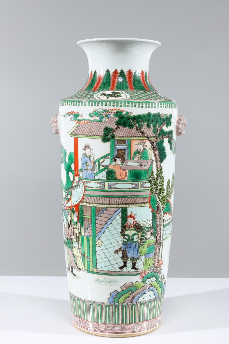 Chinese Famille Verte Enameled Porcelain Vase: Large Chinese famille verte enameled porcelain vase with warriors to body, molded mask handles to shoulder, and six-character Kangxi mark to base; overall good condition; H 20 3/4" x D 9" (approx.)