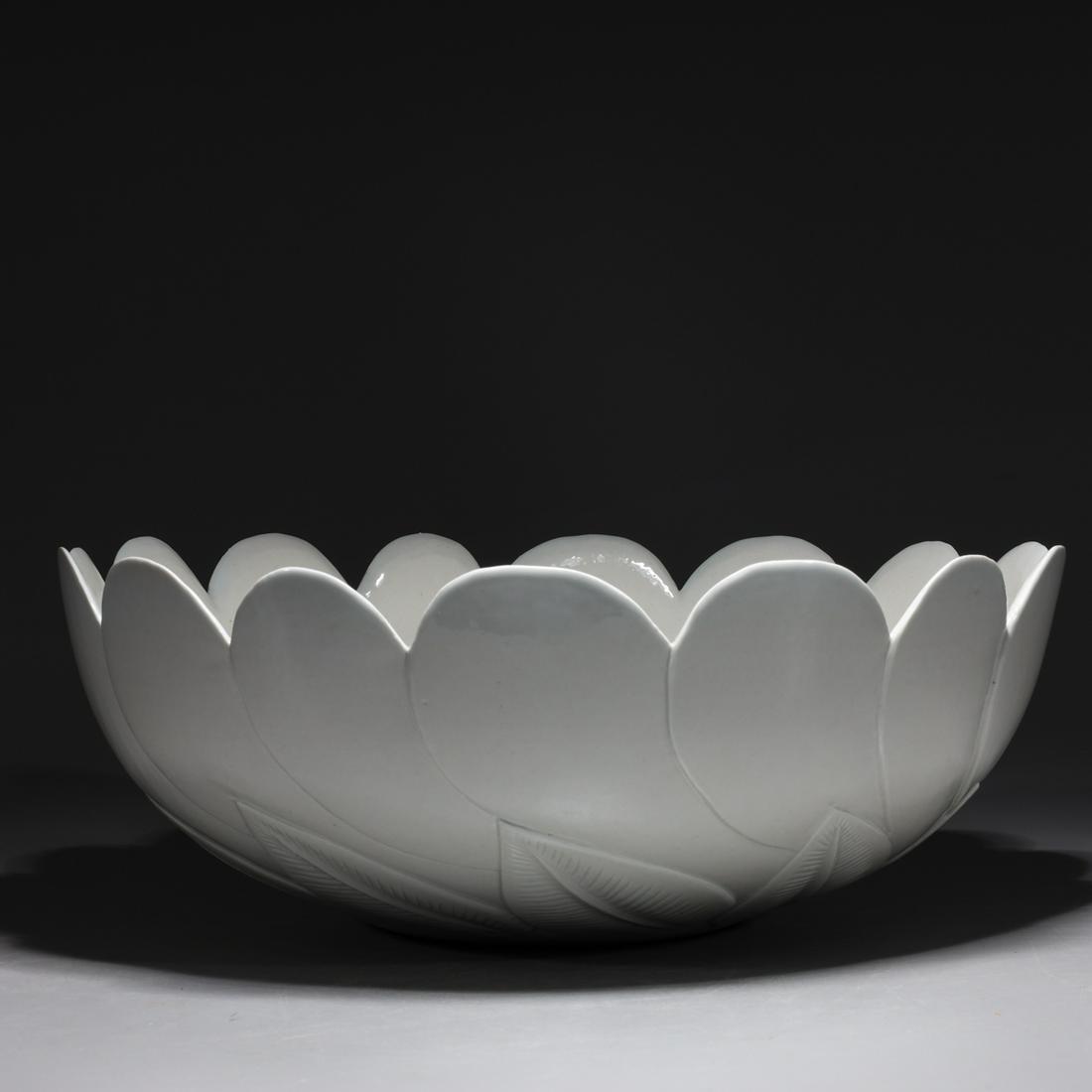 Chinese White Glazed Porcelain Flower Bowl: Chinese white glazed porcelain flower bowl with incised leaf and petal designs to body; overall good condition, minor firing flaw to interior; H 5 3/4" x D 15 1/4" (approx.)