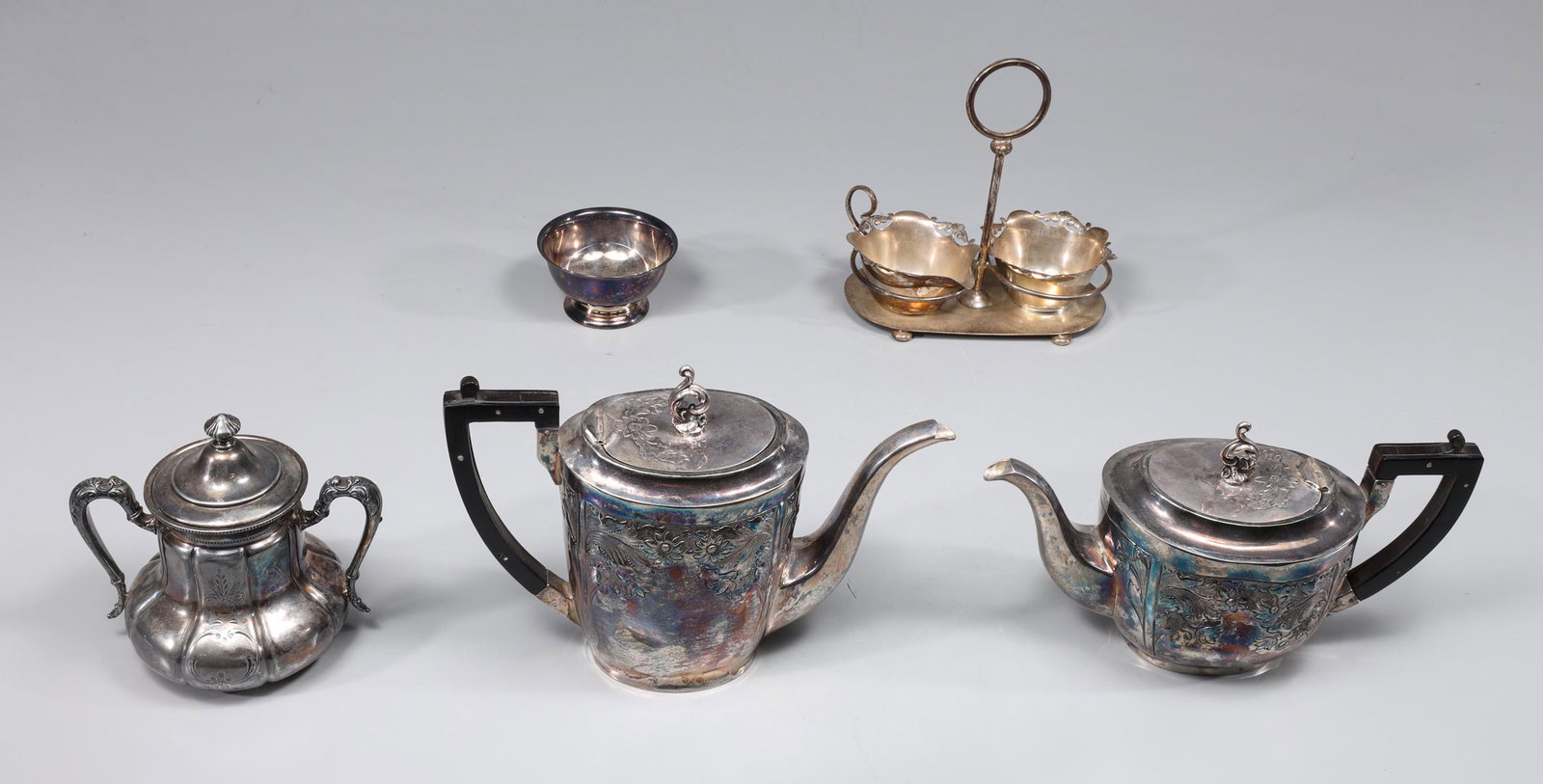 Group of Seven Antique Silver Plate Collection, Sheffield, Forbes Silver Co., Hukin & Heath: Group of seven antique silver plate service pieces, including; antique Rogers & Co. Sheffield silver plate tea pot and coffee pot c. 1900's: patina, minor dents, ;light surface wear; antique Hukin & H