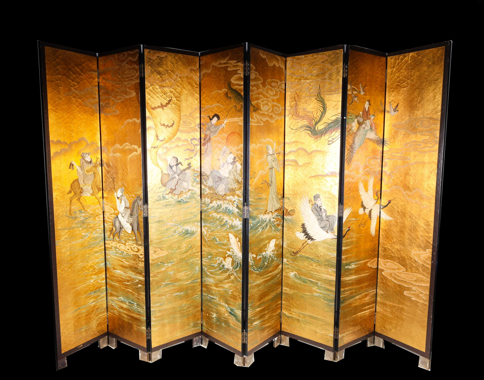 Large Chinese 8-Panel Coromandel Screen: Large Chinese 8-panel coromandel black screen with gilt lacquer interior with craquelure depicting scenes with figures and deities amidst birds and botanical detail; as is condition, age wear, surface