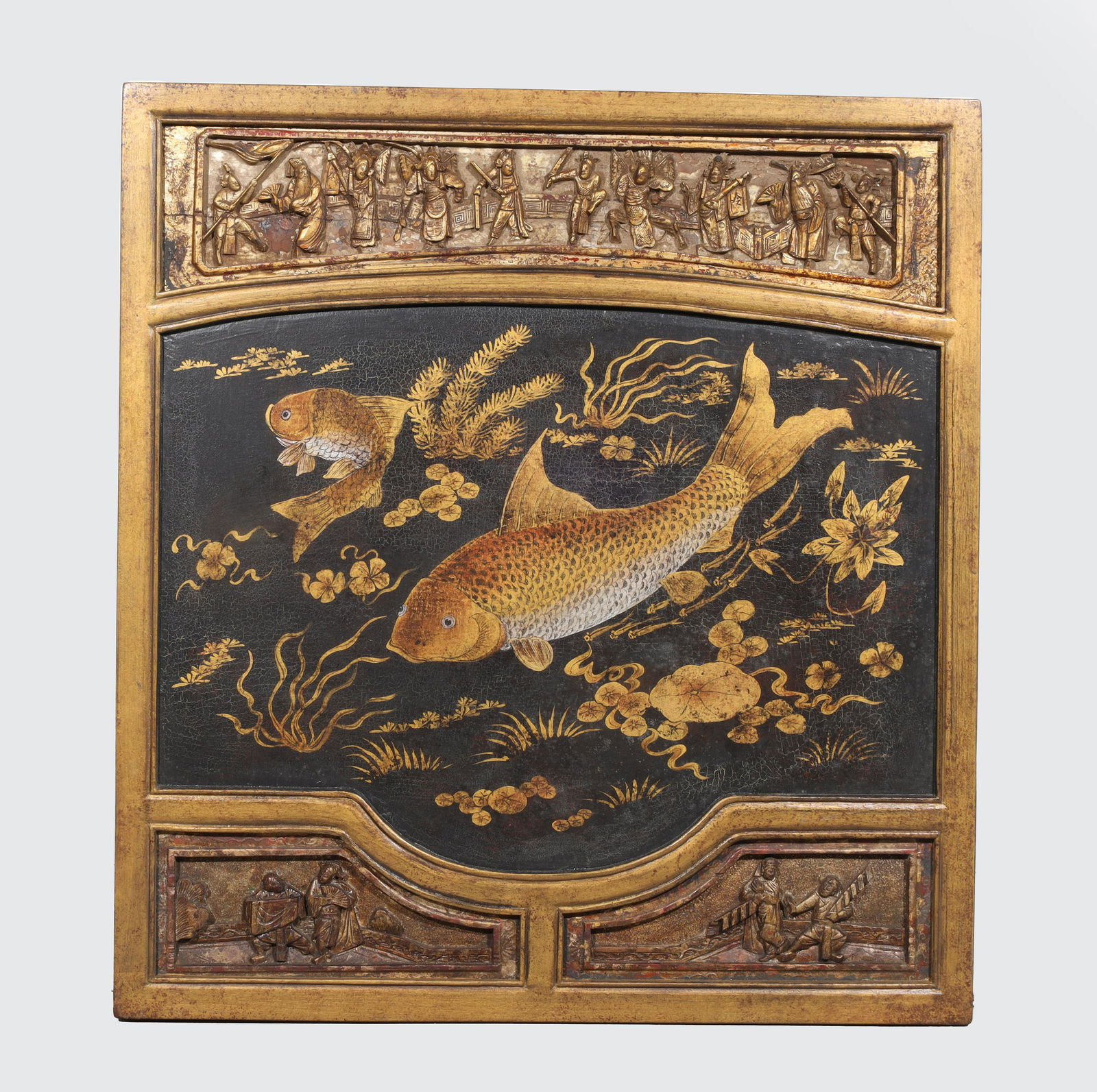 Carved Chinese Gilded Trout Panel: Carved Chinese gilded panel with center hand painted trout in pond scene, and relief panel friezes depicting various scenes on top and bottom; as is condition, craquelure, age wear, surface wear, surf