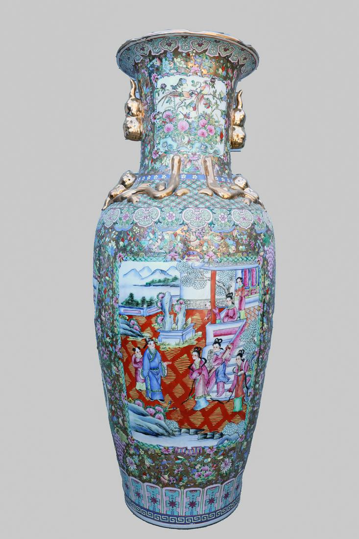 Large Chinese Famille Rose Enameled Porcelain Vase: Large Chinese Famille Rose porcelain vase decorated with enameled scenes featuring figures at court, floral motifs, gilt molded handles and gilt fluted rim; some minor loss to enamel and other flaws;