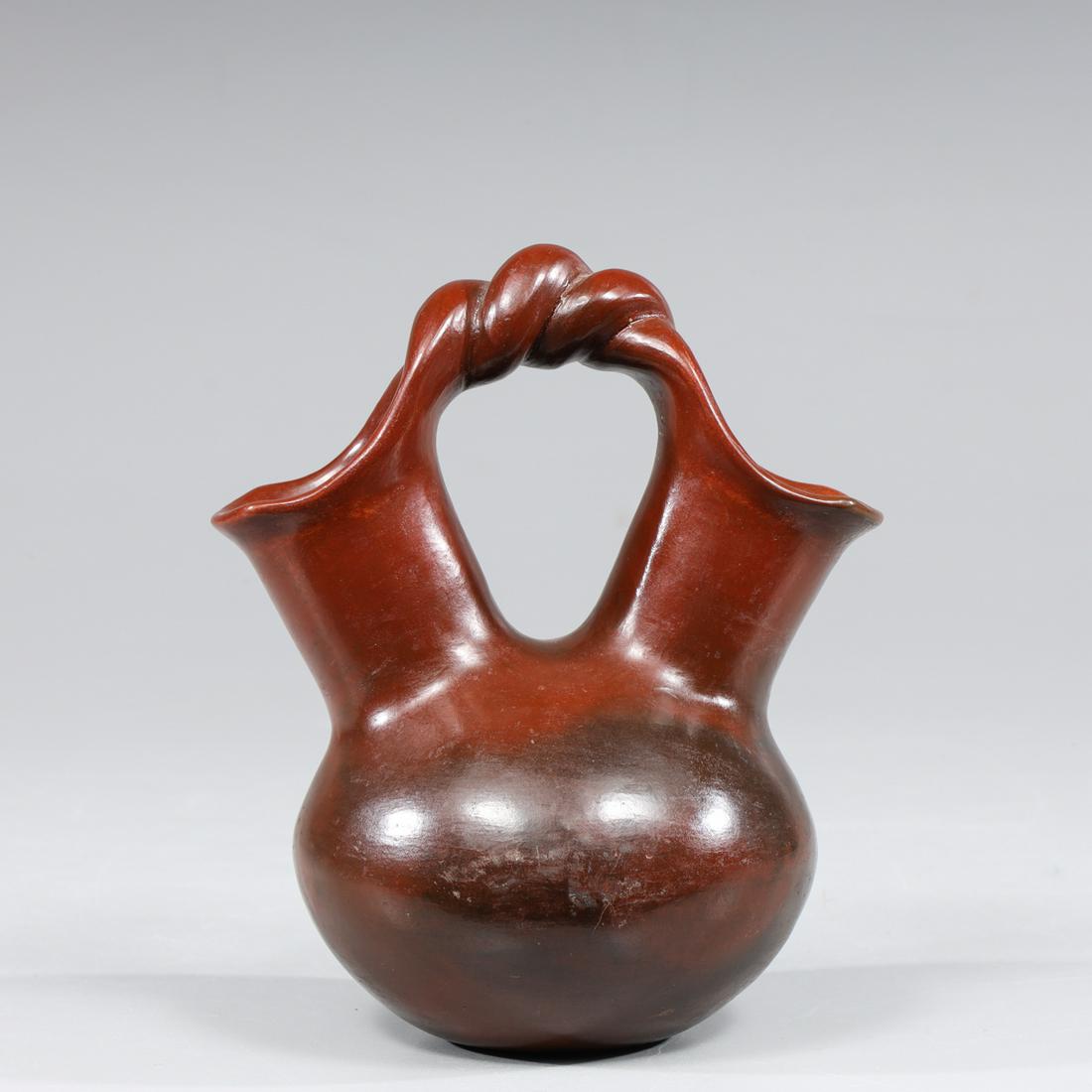 Dine (Navajo) Wedding Jug by Kevin Williams: Dine (Navajo) wedding jug by Kevin Williams; overall excellent condtion, light surface wear, light age wear; L 4" W 2 1/2" H 5" (Approx.)
