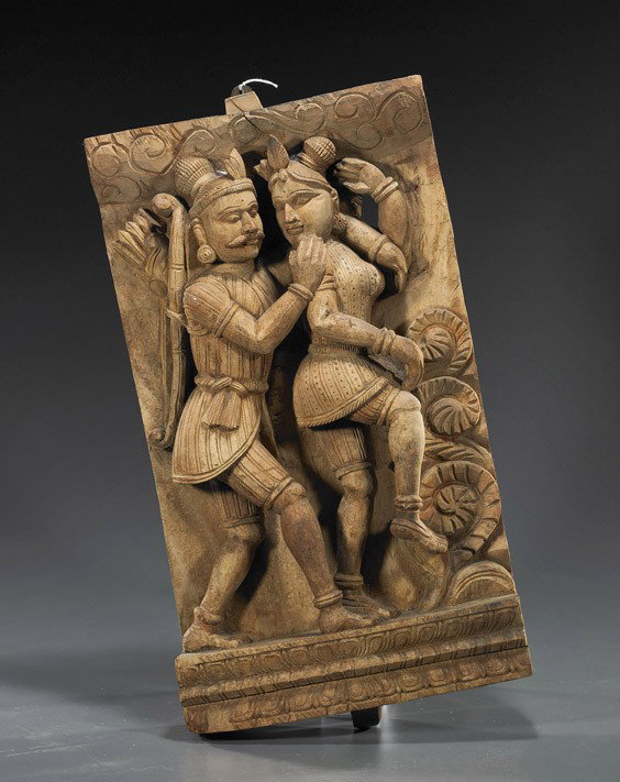 Indian Carved Wood Deity Panel: Indian Carved Wood Deity Panel Elaborately carved and heavy, Indian wood panel; depicting 2 romantically engaged deities getting (some wear) H: 22"