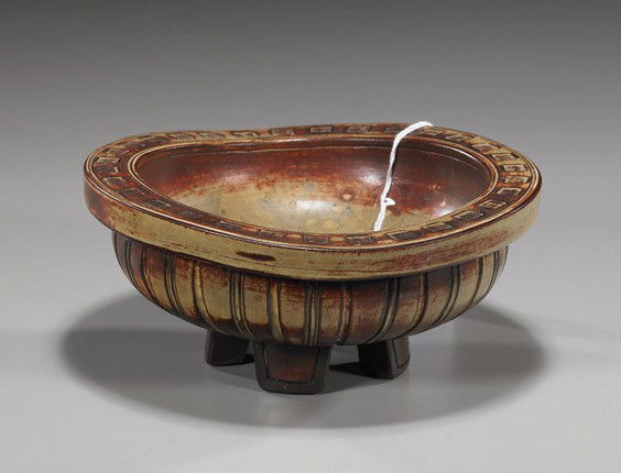 Swedish Glazed Ceramic Dish by Kåge Farsta: Swedish Glazed Ceramic Dish by Kåge FarstaSwedish Gustavsberg dish by Wilhelm Kåge Farsta; circular footed form with interior incised concentric circles, rim decorated with square patterns, manufact