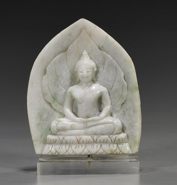 Carved Jadeite Buddhist Stele: Carved Jadeite Buddhist Stele Carved jadeite Buddhist stele, probably Burmese; depicting Buddha in relief seated on a lotus pedestal, with hands in mudra and with a leaf-form mandorla ; the mostly whi