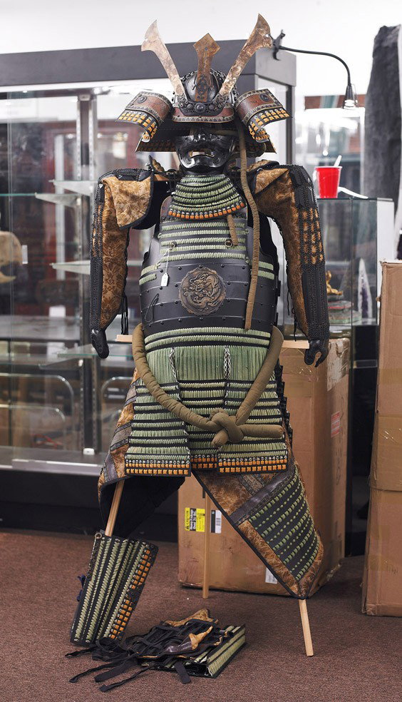 Japanese Samurai-Style Suit of Armour: Japanese Samurai-Style Suit of Armour Suit of Japanese Samurai-style armour; with full body coverings, including the helmet and face mask, primarily green and black motif with central dragon plaque (s