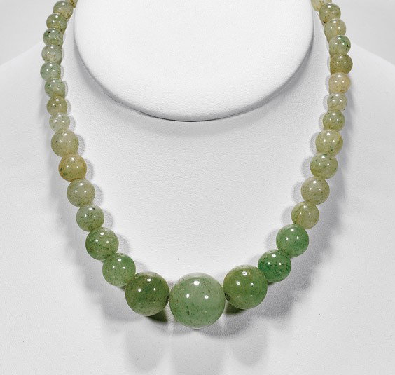 JADEITE BEAD CHOKER NECKLACE: JADEITE BEAD CHOKER NECKLACE Early 20th Century Chinese jadeite bead choker necklace; comprised of graduated beads of translucent light apple green coloration; L: 15 1/4" (approx.)