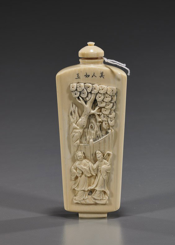 Tall Carved Ivory Snuff Bottle: Tall Scrimmed Ivory Snuff Bottle Unusually tall, Chinese carved and scrimmed ivory snuff bottle, the front with relief design of ladies beneath pine, the back with scrimmed horse and landscape motif, 