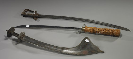 Three Various Old Swords: Group of Three Various Old Swords Three various old swords: Thai with carved wood handle; Nepalese kora with large blade; and late 18th Century British (flaws to each and some "oxidation"); L: 34 1/2"