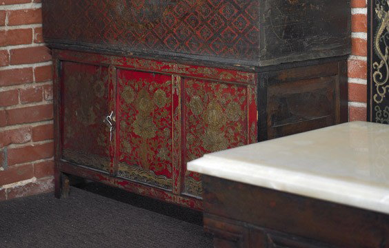 Small Tibetan/Mongolian Polychromed Cabinet: Small Tibetan/Mongolian Polychromed Cabinet Tibetan/Mongolian cabinet; with single door front and with red and gold foliate designs (wear and flaws), early 20th Century; L:42"