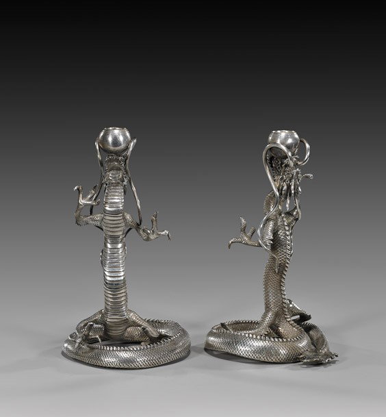 PAIR ANTIQUE JAPANESE SILVER CANDLEHOLDERS: PAIR ANTIQUE JAPANESE SILVER CANDLEHOLDERS Pair of highly unusual and antique, heavy Japanese sterling silver candleholders by Konoike of Yokohama: each in the form of a dragon standing up on its curl