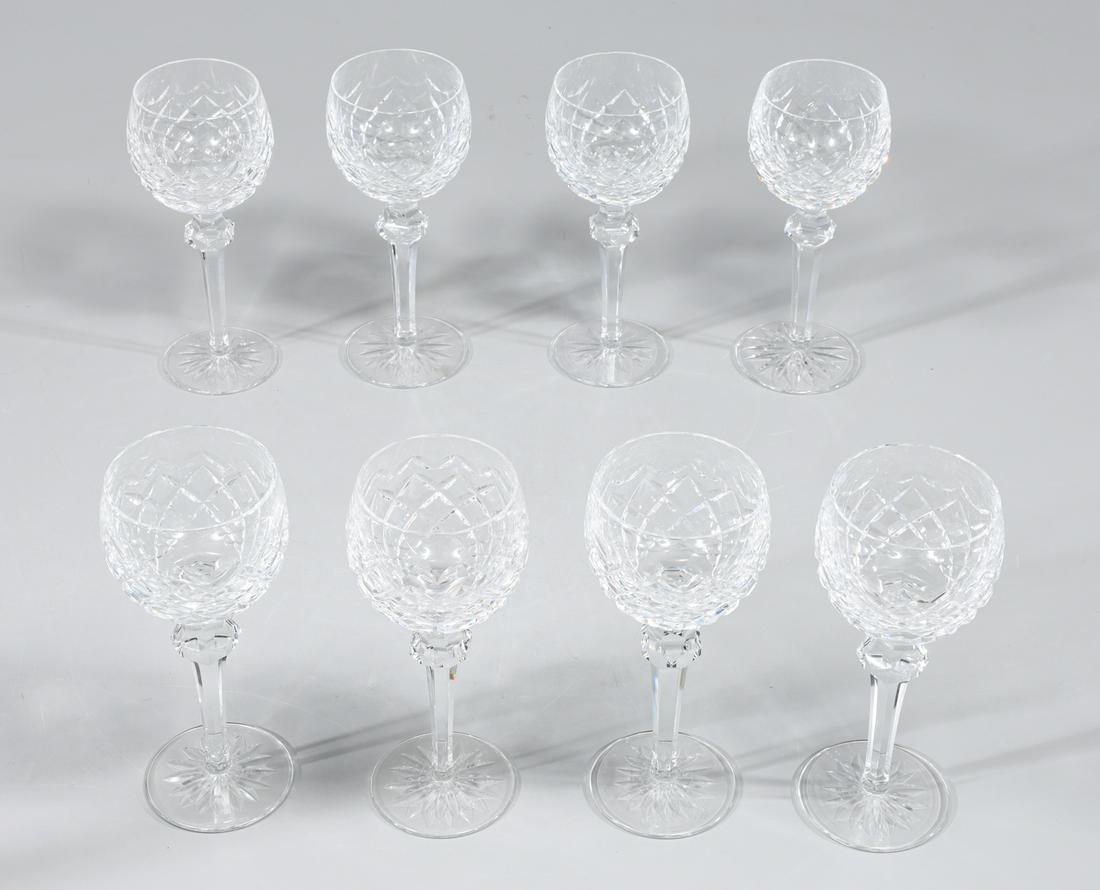 Group of Eight Waterford Wine Glasses: Group of eight Waterford crystal stemware wine glasses; as-is condition- General marks and surface wear, scratches, rubbing, flaws, and losses. Possible restorations; each H 7 1/2" (Approx.)