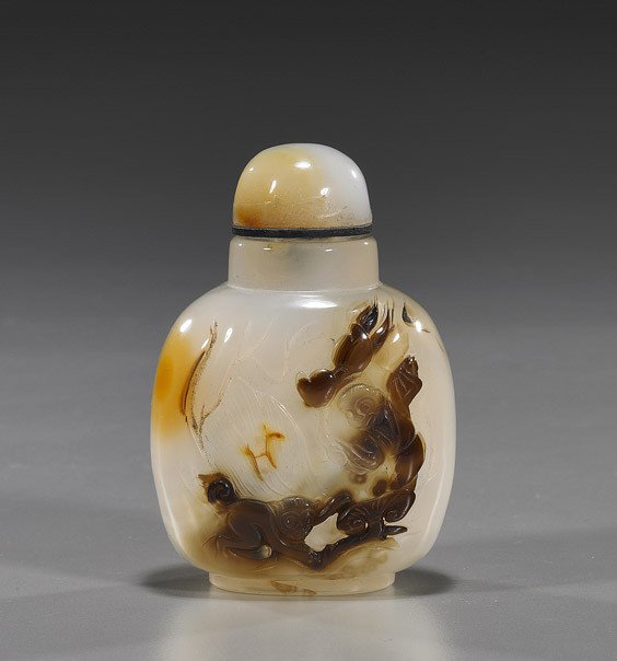 Chinese Cameo Chalcedony Snuff Bottle: Chinese Cameo Chalcedony Snuff BottleFinely hollowed Chinese gray chalcedony agate snuff bottle; somewhat rounded square form and cameo carved with three monkeys design in brown and carnelian color, m