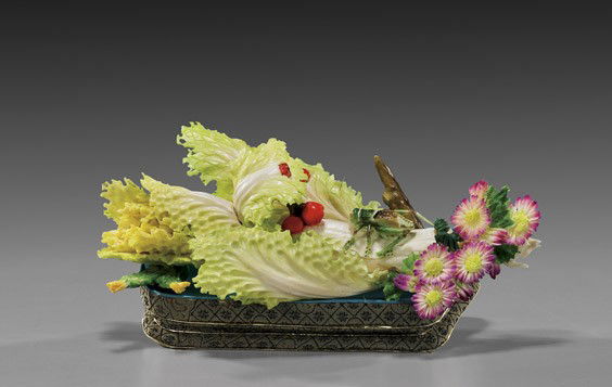 Chinese Carved & Polychromed Bone Cabbage: Chinese Carved & Polychromed Bone CabbageChinese carved and polychromed sectional bone cabbage; with small flowers, grasshopper and lady bugs; L: 8", silk stand