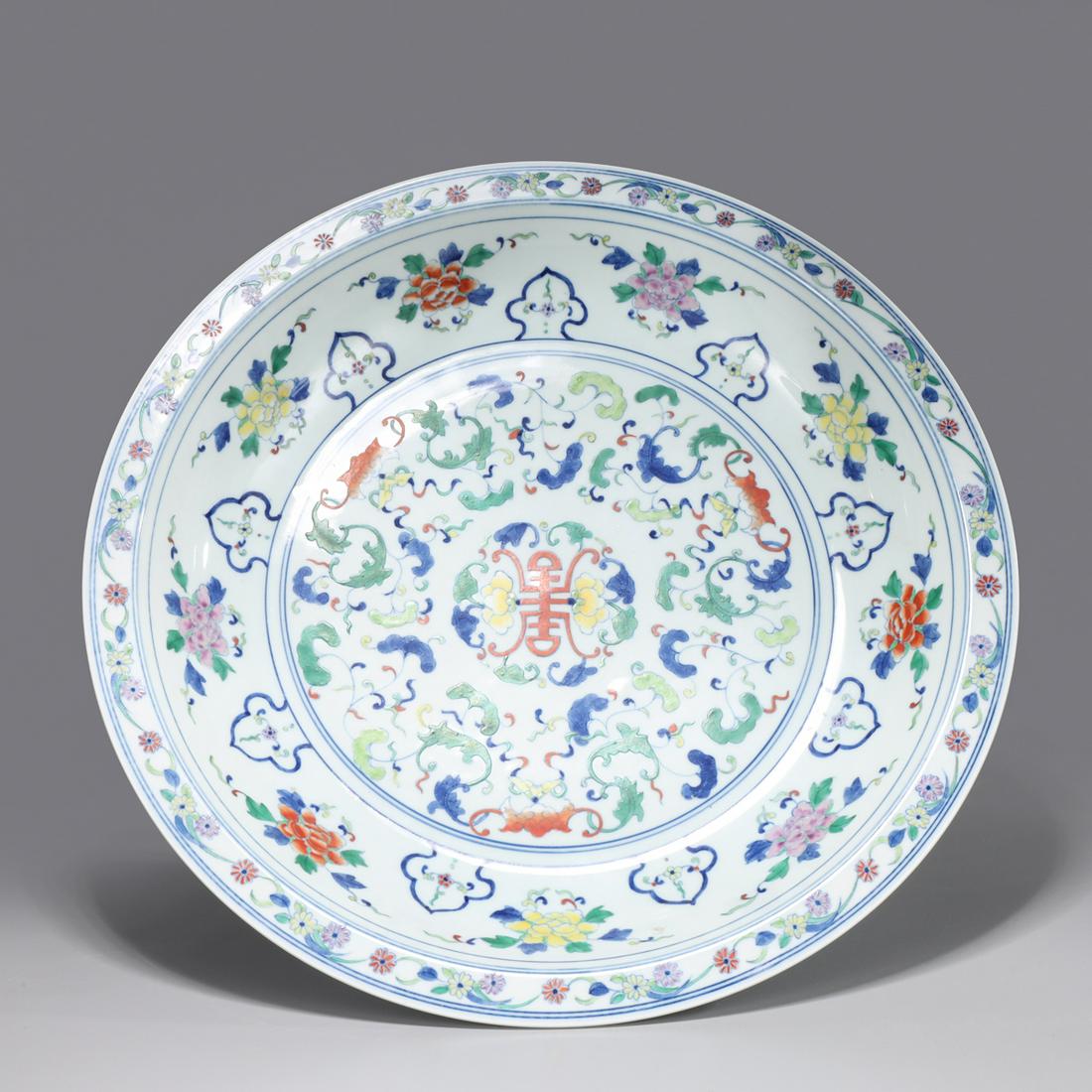 Antique Chinese Enameled Porcelain Charger: Antique, late Qing dynasty, Chinese enameled porcelain charger, centrally painted interior with Xo character surrounded by bats and ruyi beneath a border of seasonal flowers, exterior similarly decora