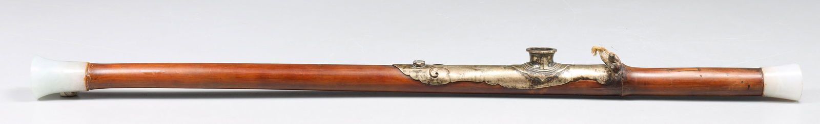 Antique Chinese Bamboo and Gilded Brass Opium Pipe: Antique, c. 1800-1850, Chinese bamboo stemmed mounted with gilded brass opium pipe; mutton fat nephrite jade mouth piece; overall good condition, age wear, surface wear; L 22 3/4" (Approx.)