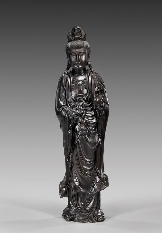 Tall Chinese Figure of Guanyin Standing: Tall Chinese Figure of Guanyin StandingTall Chinese figure of standing Guanyin; with hands in mudra, wearing typical draped robes and an unusual crown with a miniature vase; H: 20"