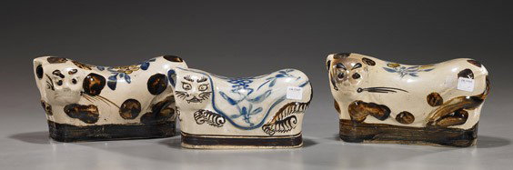 Three Antique Chinese Porcelain Cat Pillows: Three Antique Chinese Porcelain Cat Pillows Group of 3 antique Chinese cizhou-style glazed cat pillows; each with a blanket over the body with various motifs: fruits, florals, and Buddhist emblem (chi