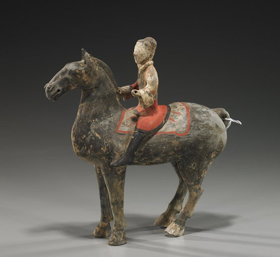 Han Dynasty Painted Pottery Equestrian: Han Dynasty Painted Pottery Equestrian Chinese Han Dynasty painted pottery equestrian: the horse standing four-square and carrying a rider, the rider holding reigns; black slip horse body and with pai