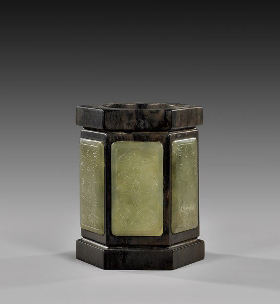 HARDWOOD BRUSHPOT WITH JADE PANELS: HARDWOOD BRUSHPOT WITH JADE PANELS Chinese hardwood brushpot; of hexagonal form with six yellowish-green jade panel insets: alternating bats and archaistic characters; possibly Zitan wood; H: 4 3/4"