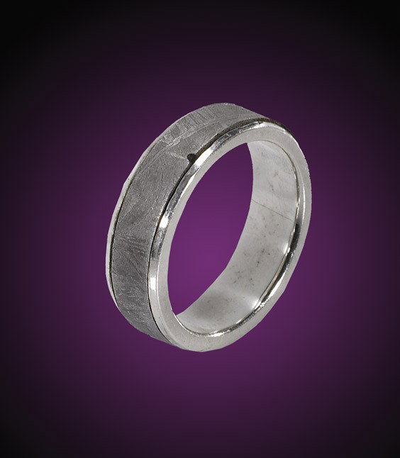 METEORITE RING: METEORITE RINGMuonionalusta – fine (IVA) octahedriteNorthern SwedenThe renowned Muonionalusta iron octahedrite is prized for its sharply defined Widmanstätten patterns, exposed here by acid etching