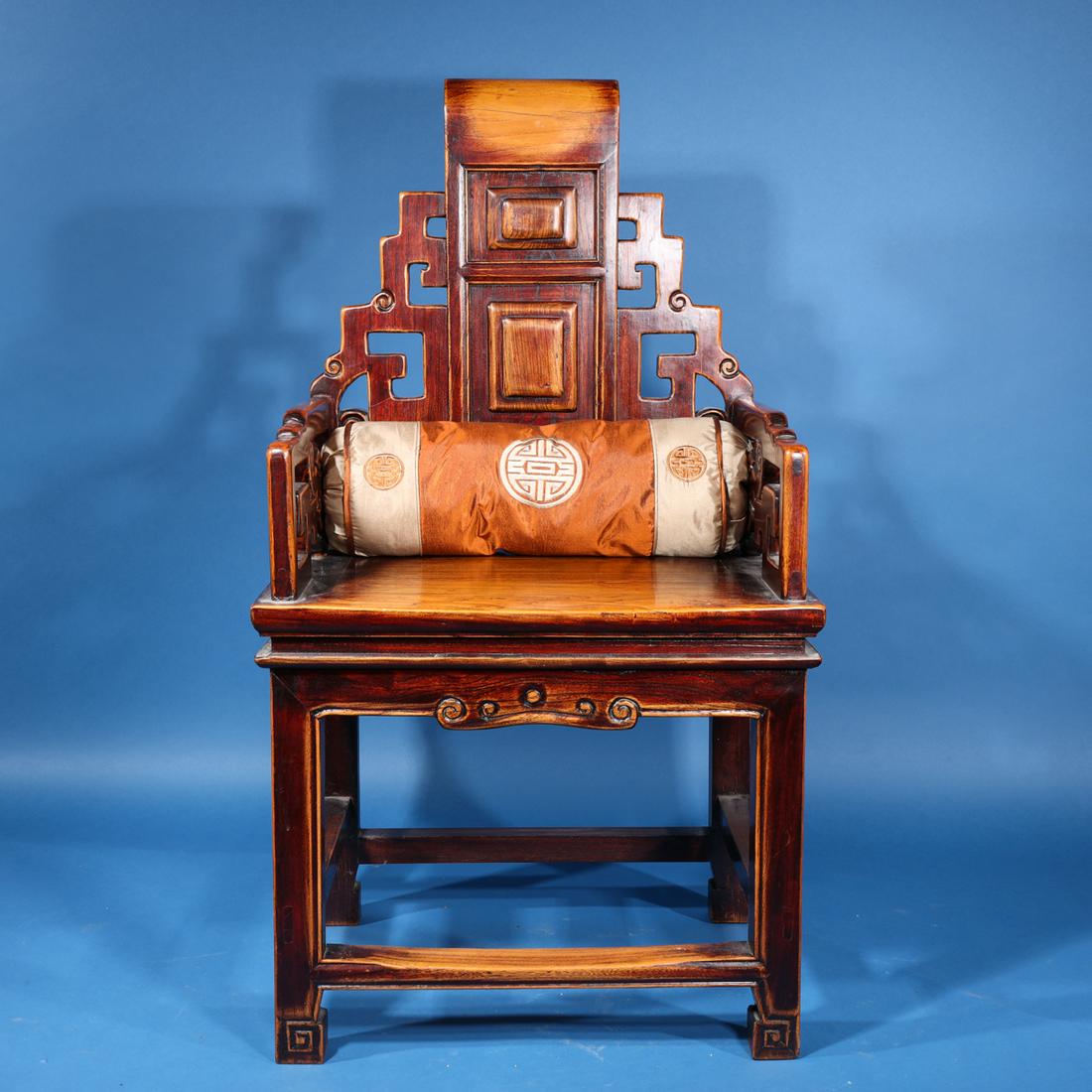Chinese Carved Hardwood Chair: Chinese carved hardwood armchair with silk pillow; overall good condition; H 45" x W 24 1/2" x D 14" (approx.)
