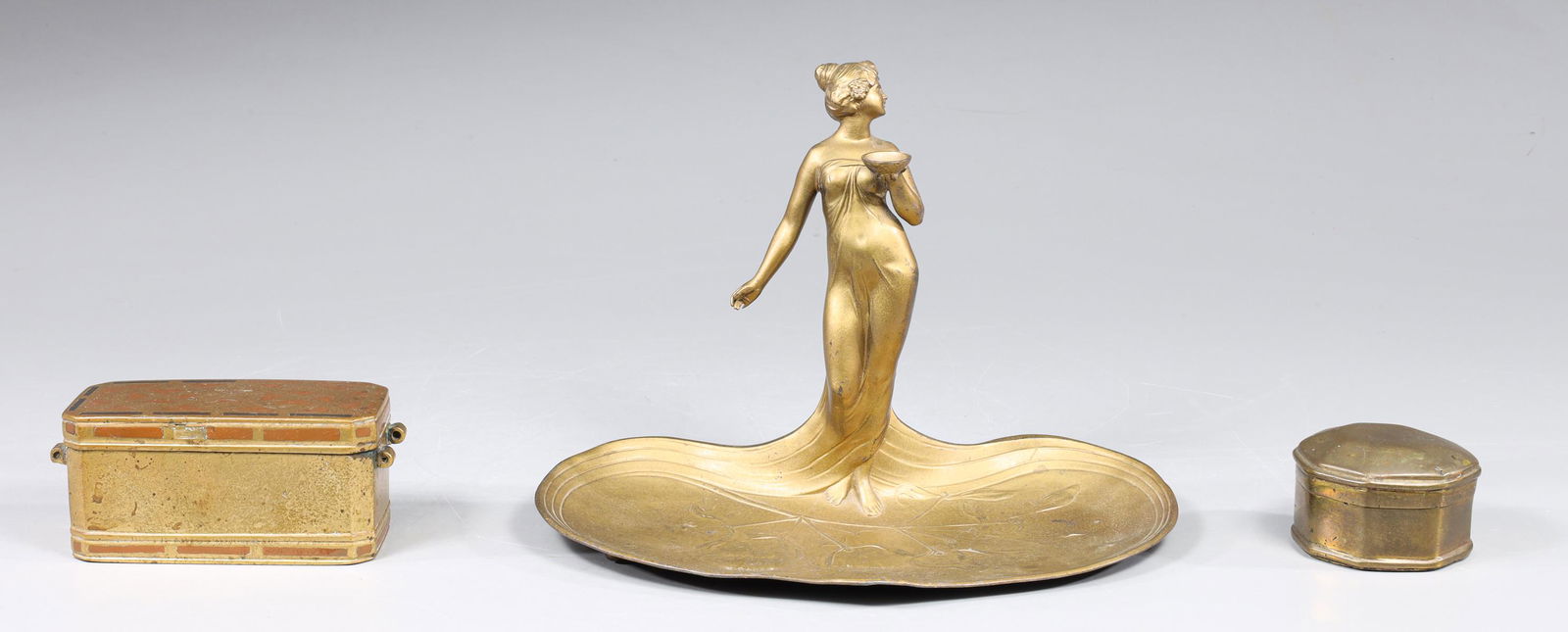 Group of Three Antique Brass Art Nouveau Collection: Group of three antique art nouveau brass and cast metal collection, including: 18th century brass Philippines betel nut box; 18th century brass Thai betel box; gilded cast metal figural nude art nouve