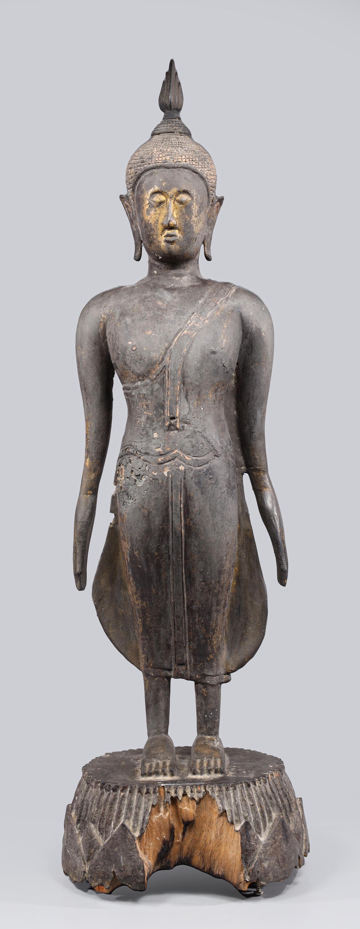 Antique Carved Burmese Buddha: Antique, 19th century, carved wood Burmese standing Buddha "Revealing the Worlds"; as is condition, loss to plinth, flaws, other losses, age wear, surface wear, surface soiling; L 8" H 31" (Approx.) P