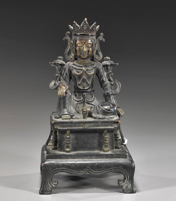Chinese Bronze Buddhist Deity: Chinese Bronze Buddhist Deity Chinese Ming-style bronze Buddhist Bodhisattva; seated in position of "Royal Ease", wearing an elaborate crown and holding lotus flowers, on a square raised footed pedest