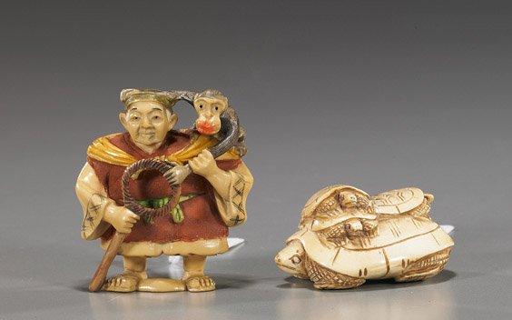 Two Carved Ivory Netsuke Groups: Two Carved Ivory Netsuke Groups Two carved ivory netsuke: parcel polychromed monkey trainer with a monkey on his shoulder; and a group of turtles with three turtles on the back of a larger turtle, bot
