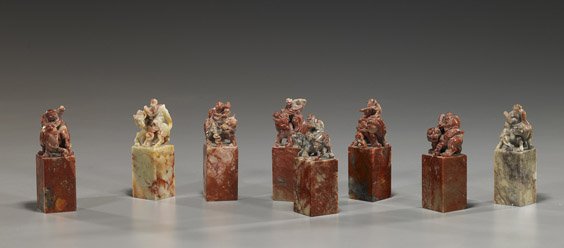Set of Chinese Carved Soapstone Seals: Set of Chinese Carved Soapstone Seals Set of 8, early 20th Century, Chinese carved soapstone seals: each of squared form and each also surmounted with an Immortal riding on the back of an animal; in v