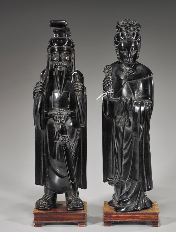 Pair Tall Chinese Amberine Emperor & Empress: Pair Tall Chinese Amberine Emperor & Empress Pair tall, early 20th Century Chinese amberine ("cherry amber") Emperor and Empress: he wearing a cap and with a sword at his belt, holding his hair with b