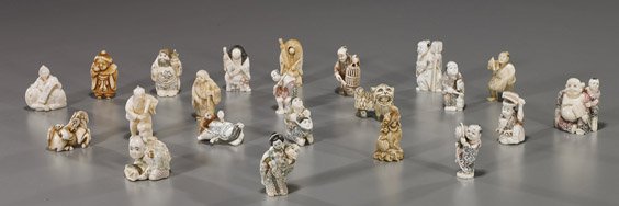 Box of 21 Various Carved Ivory Netsuke: Box of 21 Various Carved Ivory Netsuke Box of 21 various carved ivory netsuke: mostly figural, most signed, some with polychrome; two turn-faced Hanya; a qilin; and a horse with a rat on its back; tog
