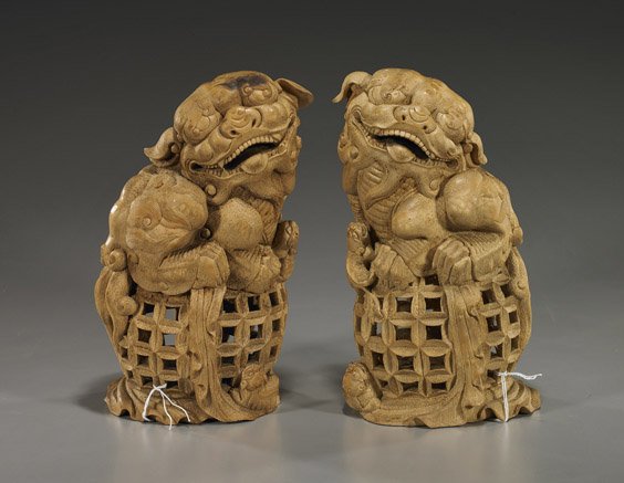 Pair Elaborately Carved Bamboo Lions: Pair Elaborately Carved Bamboo Lions Pair very elaborately carved, Chinese bamboo models of lions: each seated atop large openwork balls and each with cubs; H: 10 1/2" (each)