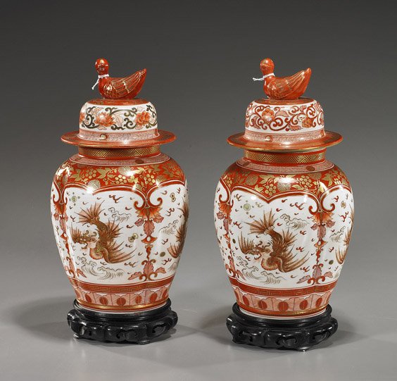 Pair Antique Japanese Kutani Porceain Jars: Pair Antique Japanese Kutani Porceain Jars Pair charming, antique Japanese Kutani porcelain covered jars: each of lobed ovoid form with coral red and gilt flying dragon and foliate motifs; covers with