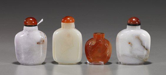 Four Chinese Snuff Bottles: Jade & Carnelian: Four Chinese Snuff Bottles: Jade & Carnelian Group of 4 Chinese snuff bottles: 3 well hollowed mottled jade, each with carnelian agate stopper; and a carved carnelian with fan motifs front and back (n