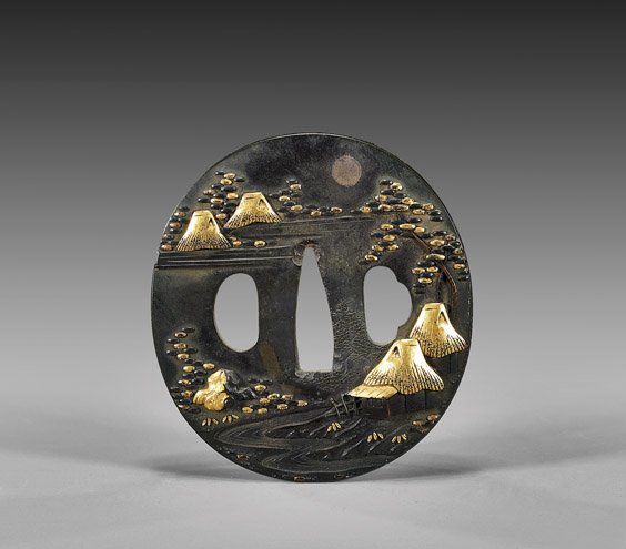 ANTIQUE JAPANESE BRONZE TSUBA: 銅製日本刀鐔 ANTIQUE JAPANESE BRONZE TSUBAAntique Japanese bronze tsuba; of oval form, with scene of mixed-metal landscape scene of huts along a running river, sign