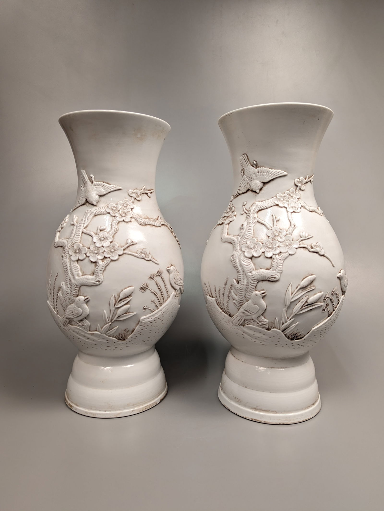 Pair Qianlong-Style Relief White Porcelain Vases (1 of 3)