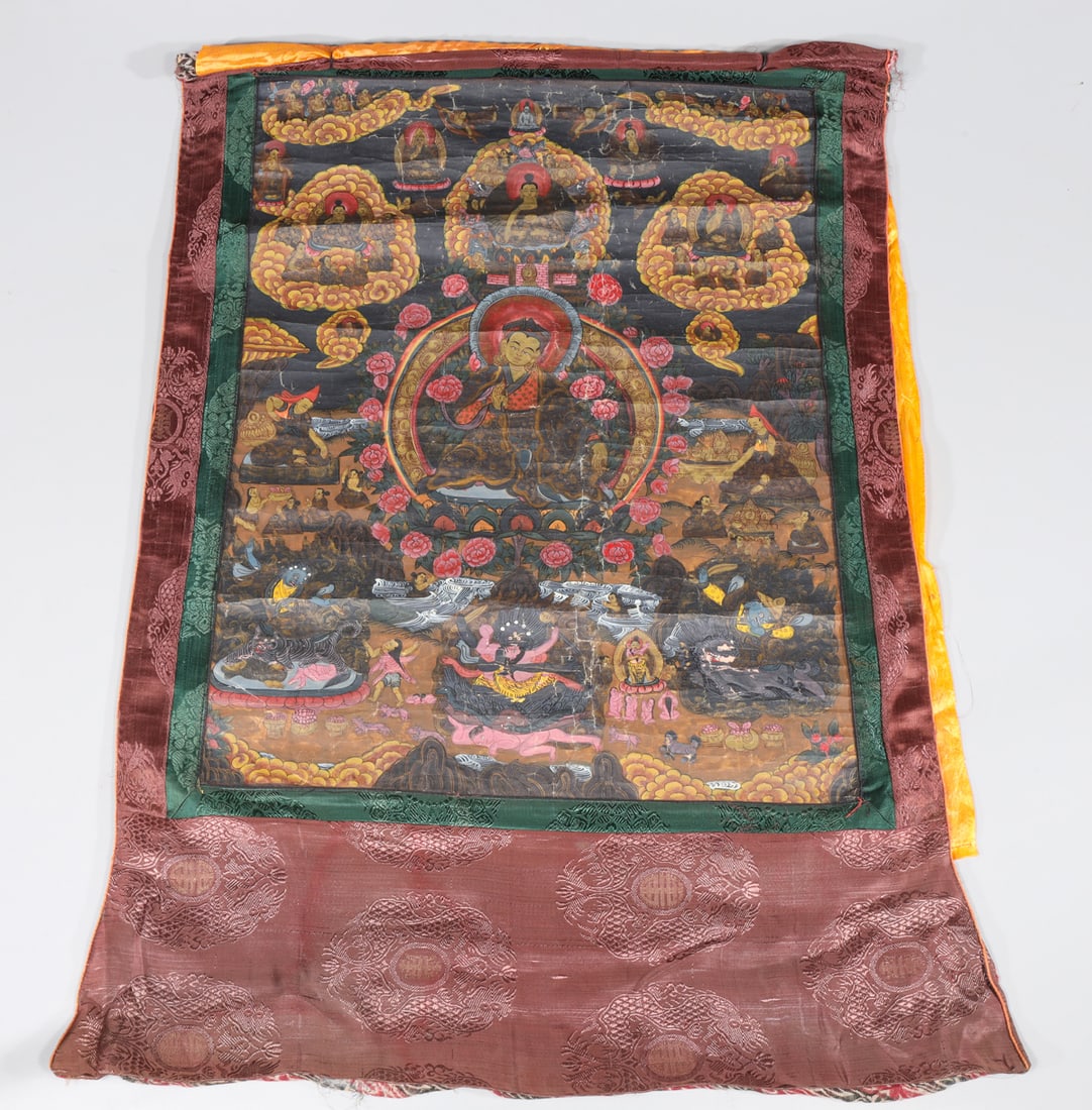 Vintage Tibetan Thangka: Vintage Tibetan thangka on silk; as-is condition- General marks and surface wear, scratches, rubbing, flaws, and losses. Possible restorations; L 26" H 35" (Approx.)