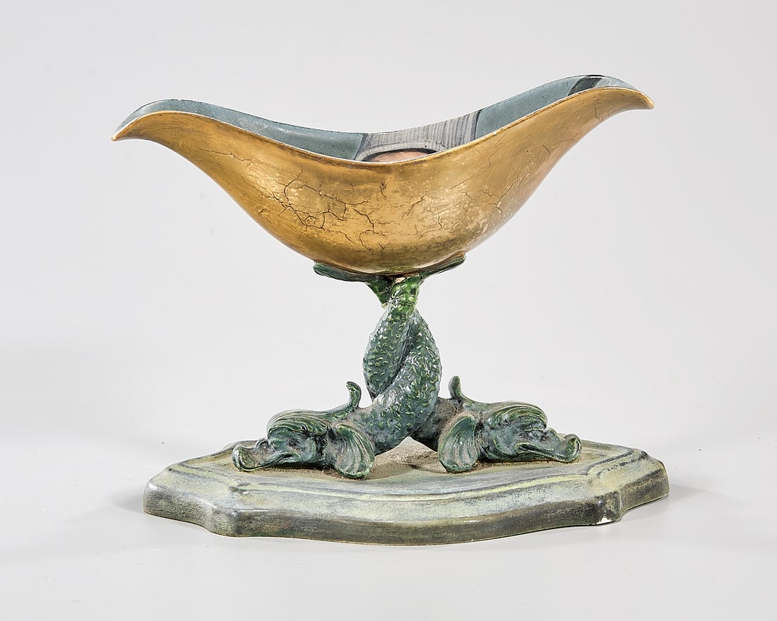 Hand Decorated Stem Dish by Cindy Kolodziejski: Painted and gilt earthenware dish by Cindy Kolodziejski (American b. 1962); with a hand holding a fish to interior and sea creature-form stem connected to base; signed underneath; 4 3/4" x 6" x 4" (ap
