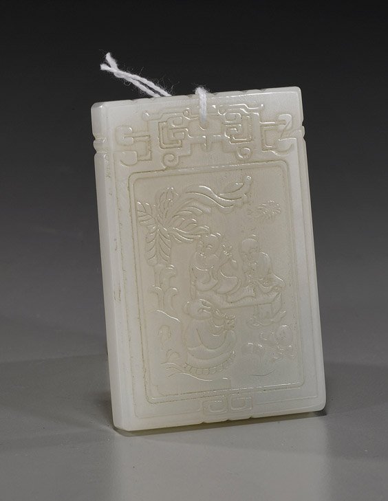 Large Carved White Jade Pendant: Large Carved White Jade Pendant Large Chinese carved white jade pendant; rectangular with low relief design of three figures in a landscape to the front and calligraphy to the reverse, archaistic moti