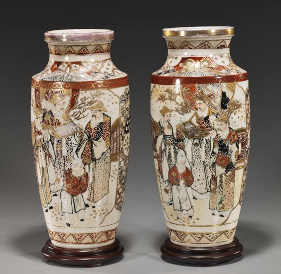Pair Japanese Satsuma/Kyoto-ware Vases: Pair Japanese Satsuma/Kyoto-ware Vases Pair early 20th Century, Japanese Satsuma or Kyoto-ware vases; each of tapered form with defined shoulder and with designs of figures in a landscape gathered aro