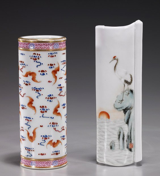 Two Chinese Scholar's Desk Porcelains: Two Chinese Scholar's Desk Porcelains Two Chinese scholar's desk porcelains: cylindrical brushpot with Famille Rose enamel and coral red bats (some wear to rim), 6-character mark; together with a wris